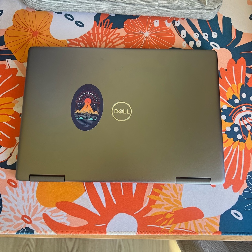 Dell Inspiron 13 7000 2in1 laptop. Converts to tablet and is touchscreen.